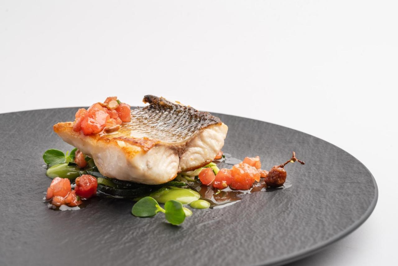 Eurostars Hotel De La Reconquista Oviedo Esterno foto A prepared fillet of grouper